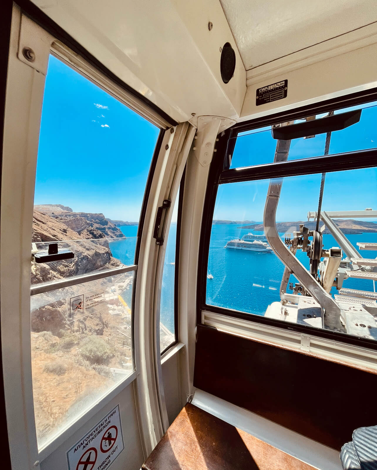 Riding the cable car in Santorini