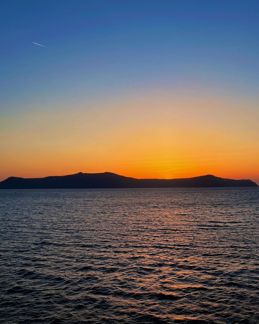 Beautiful sailaway sunset as we depart Santorini